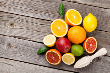 Citrus fruits on wooden table