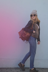 Fashion girl of casual stylish woman on a blue background.