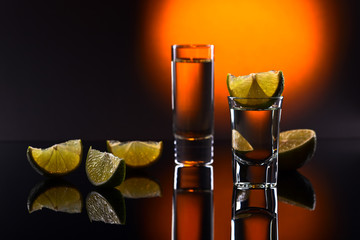 tequila on black reflective background