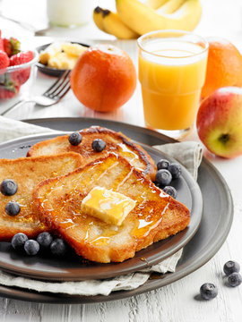 French toast with butter and honey