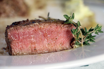 Cut filet mignon.