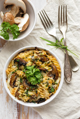Casserole with fusilli pasta, mushroom, cheese and herbs