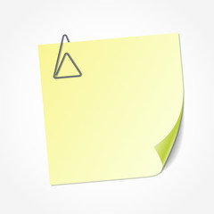 Yellow sticky note, clip in the shape of triangle