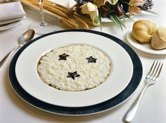 White risotto with chocolate starlets