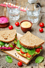 rye sandwiches with carrots and beetroot hummus and vegetables