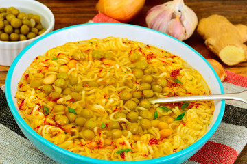 Healthy and diet food: White beans, canned peas, noodles, saffro