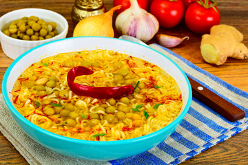Healthy and diet food: White beans, canned peas, noodles, saffro