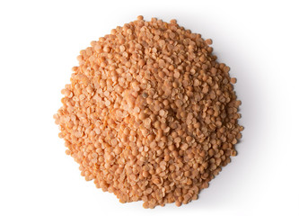 A pile of red lentils isolated on white with a slight shadow.
