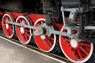 red Wheels of steam locomotive