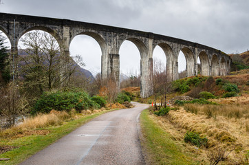 Fototapeta na wymiar Glenfinnan Railway Viaduct in the Highlands of Scotland on a Cloudy Winter Day