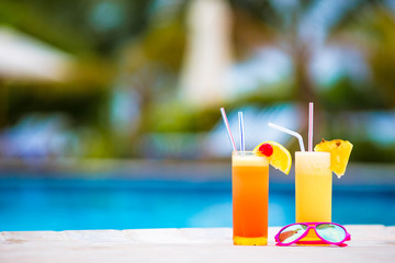 Two tasty cocktails on tropical white beach