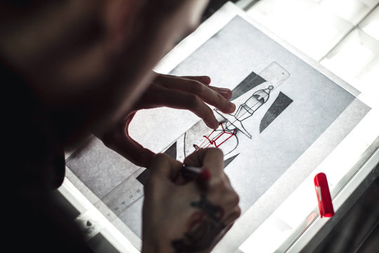 Naklejki Master tattoo artist prepares the transfer tattoo sketch