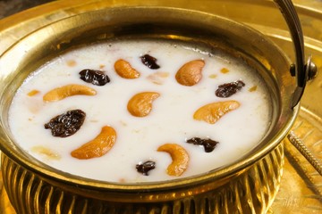 Indian Rice pudding payasam decorated with Cashews and raisin