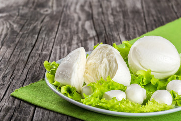 mozzarella balls and lettuce leaves