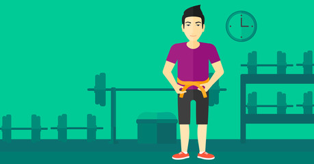 Man measuring waist.