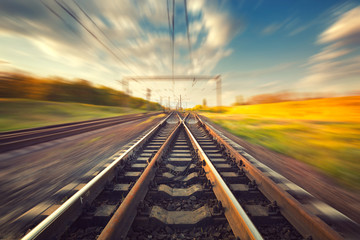 Cargo train platform at sunset. Railroad. Railway station © den-belitsky