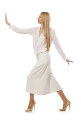 Fototapeta premium Blond hair model in elegant flared pants isolated on white