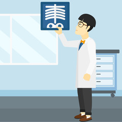 Fototapeta premium Doctor examining radiograph.