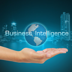 Businessman hand show business intelligence concept on virtual s