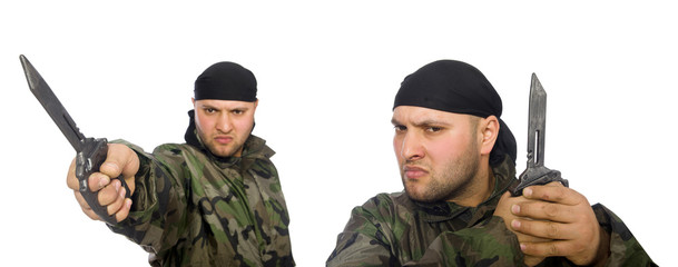 Young man in soldier uniform holding knife isolated on white