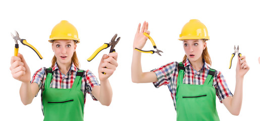 Construction worker female with pliers isolated on white