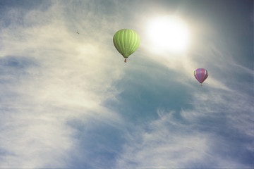 Colorful hot air balloon high in the sky