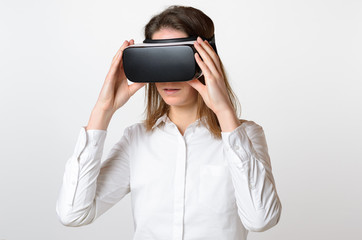 Woman holding 3D viewer over face