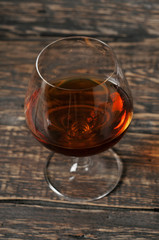 vintage cognac in large round glass