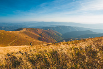 Fototapeta premium Photographer in a mountains
