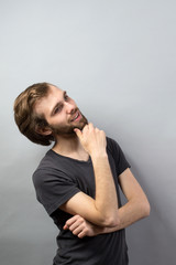 portrait of young man thinking
