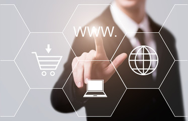 businessman pressing button on virtual screens