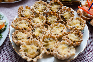 Julienne with cheese, chicken and mushrooms