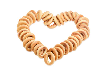 Bunch of bagels laid out in the form of heart