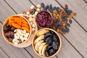 Dried fruits in wooden bowl