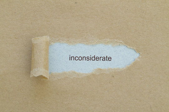 inconsiderate word written under torn paper.