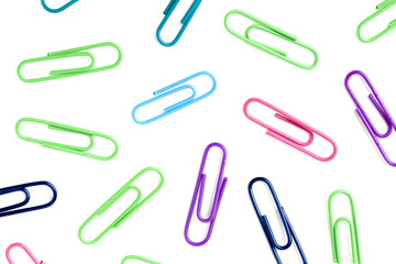 colorful paper clips on white background