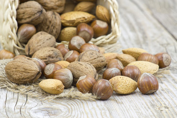 nuts on old wooden background