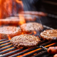 Crédence de cuisine en verre imprimé Grill / Barbecue flame broiled hamburger patties cooking on grill