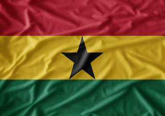 Waving flag of Ghana. Flag has real fabric texture