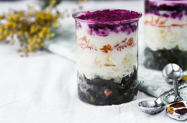 layered salad with sea cabbage, beets, potatoes and carrots