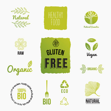 Set of design icons for organic and bio food. Raw vegan, gluten free and bio badges. Vector illustration