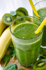 Fresh and healthy green smoothie  with spinach,banana, kiwi