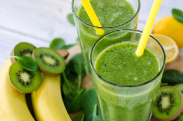 Fresh and healthy green smoothie  with spinach,banana, kiwi