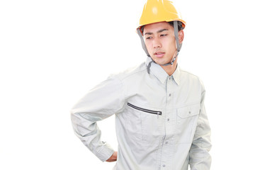 腰痛を訴える労働者