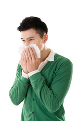 Sneezing asian man