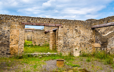 Fototapeta na wymiar Ruins of Roman houses in Pompeii
