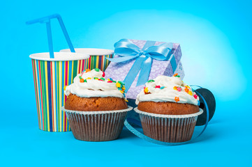 two cupcakes and gift