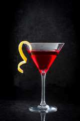 Cosmopolitan cocktail on black background

