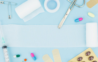 Medical equipment, on light blue background with copy-space