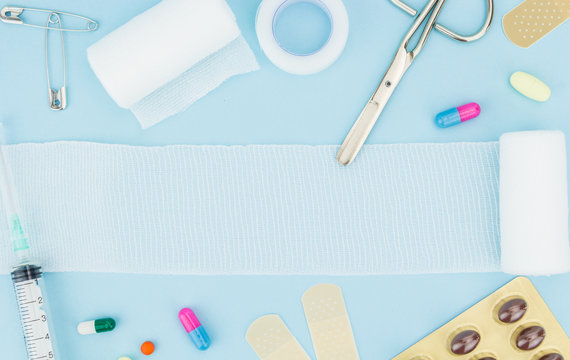 Medical equipment, on light blue background with copy-space